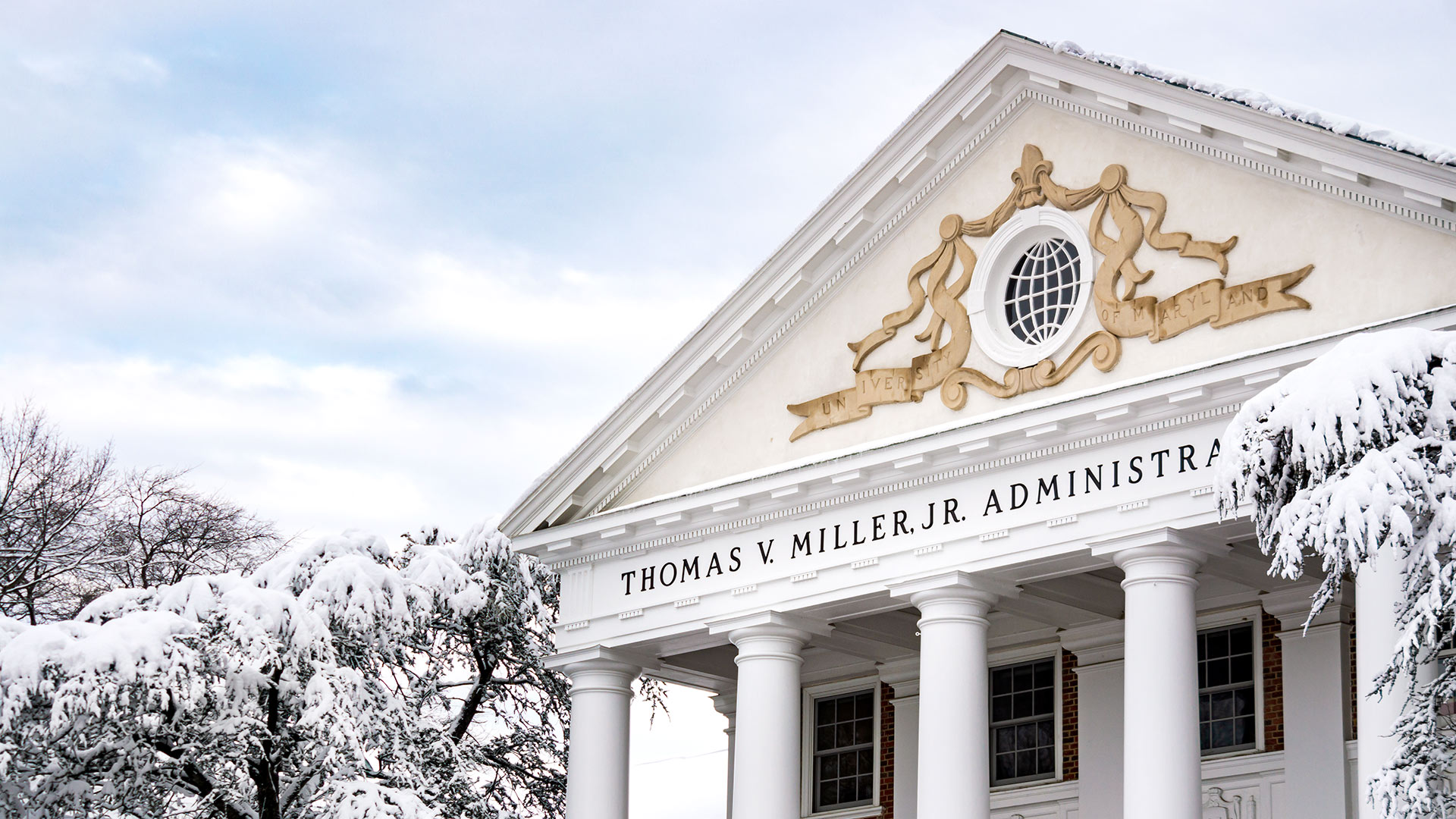 Thomas V. Miller Jr. Administration Building covered in snow