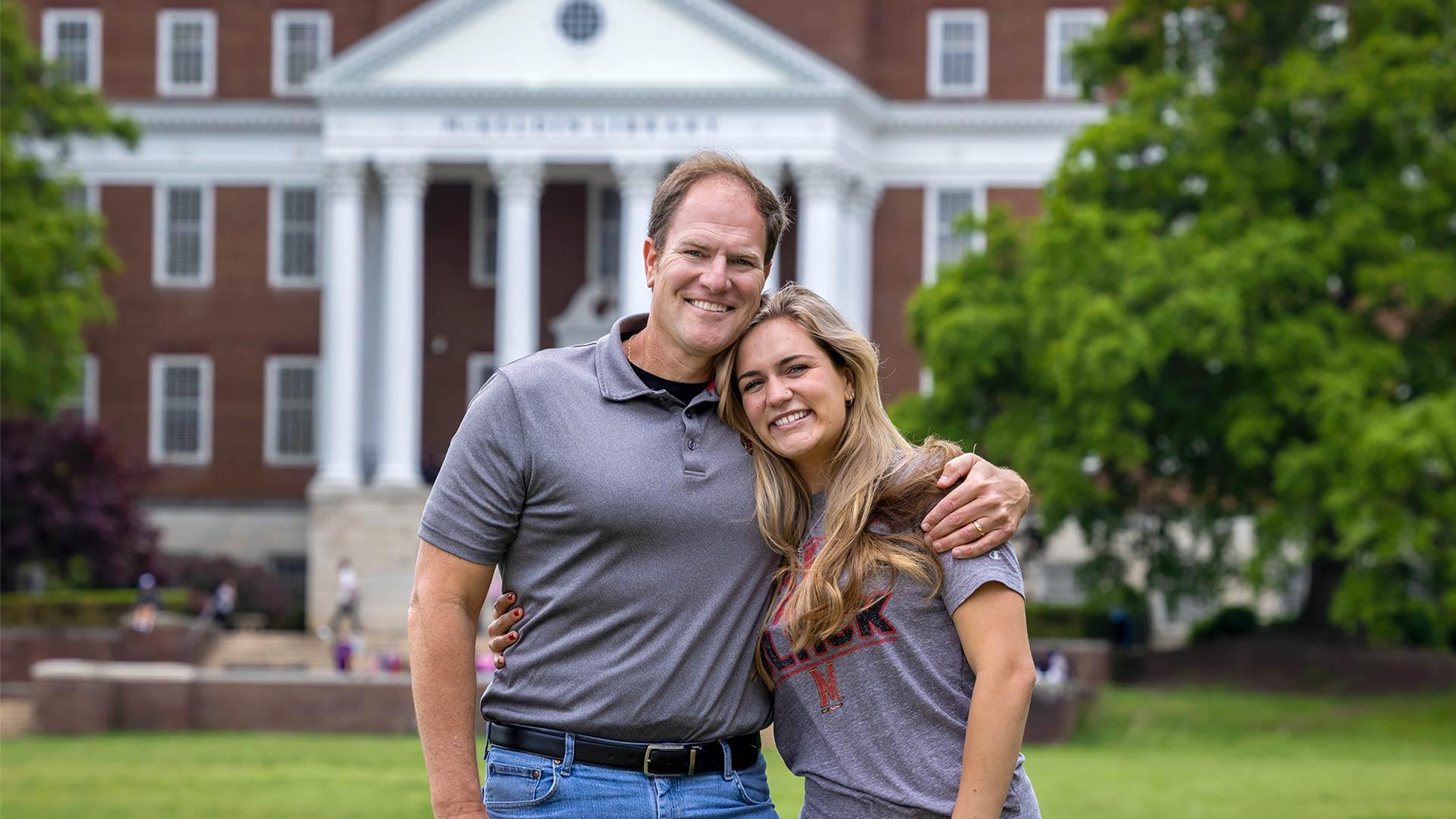 With her graduation this week, Kelly Kolanowski, shown with her dad, Paul '94, will become the fifth generation of Terp alums from her family. Photo by Stephanie S. Cordle.